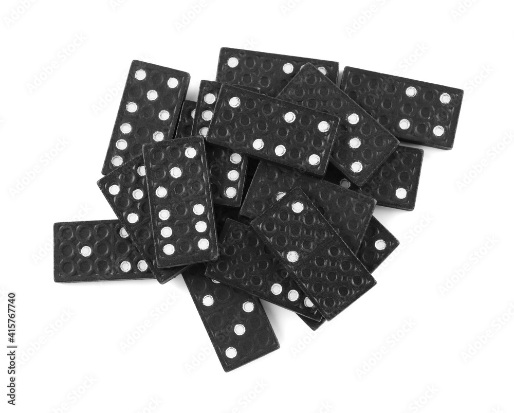 Poster Pile of black domino tiles on white background, top view