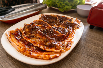 Selective focused, Seasoning pork belly for Korean BBQ or Samgyeopsal.