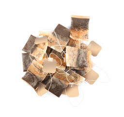 Used tea bags on white background, top view
