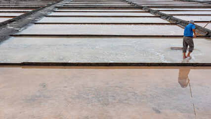 Sea salt in evaporation pools with pastel shades.