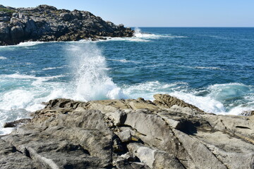 View from a cliff with waves breaking at famous Rias Baixas in Galicia Region. Porto do Son, Coruña, Spain.