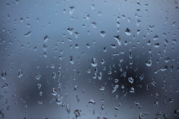 rainy days, rain drops on the window surface