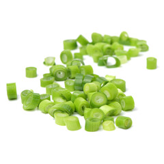 chopped green onions on white background