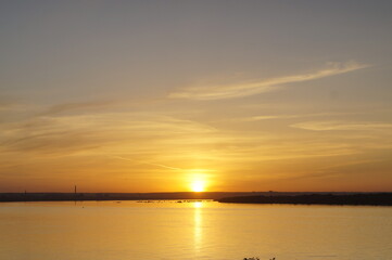 Fototapeta na wymiar superb sunset on the river
