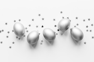 Silver Easter eggs with decoration. Wealth and good luck concept.