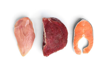Fresh raw meat, salmon and chicken fillet isolated on white background. Natural food high in protein.