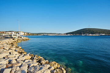 Fototapeta na wymiar Beautiful Sea View of Cesme which is a coastal town and the administrative centre of the district of the same name in Turkey's western most end