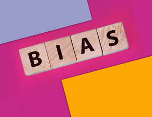 the word bias on wooden blocks blue background
