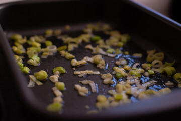 fried leek on a pan on the stove