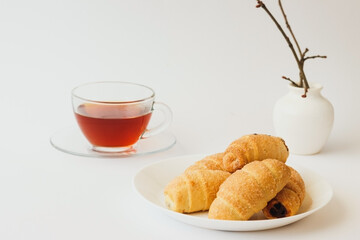 Fresh sweet crescent rolls with jam.