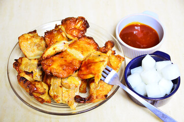 roasted chicken with seasonings, closeup - Korean favorite cuisine