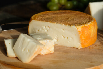 Close up cheese on wooden background 