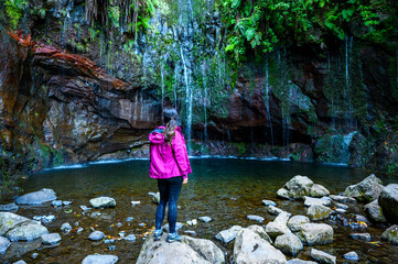 25 Fontes Waterfall - Hiking Levada trail in Laurel forest at Rabacal - Path to the famous Twenty-Five Fountains in beautiful landscape scenery - Madeira Island, Portugal