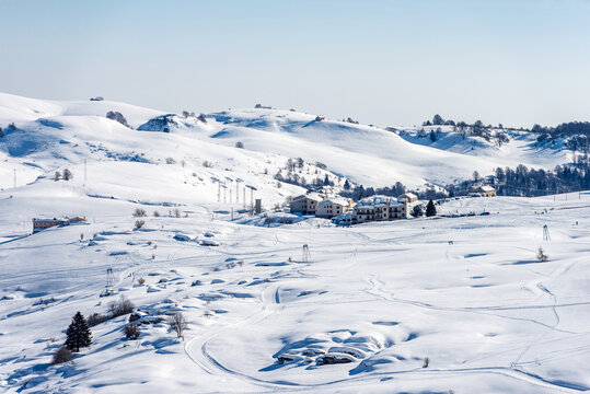 Malga San Giorgio, Ski Resort in winter with snow. Altopiano della Lessinia (Lessinia Plateau), Regional Natural Park, Bosco Chiesanuova Municipality, Verona province, Veneto, Italy, Europe.