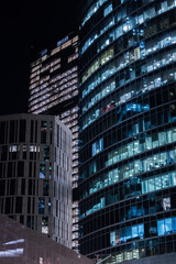 Obraz premium Night cityscape with skyscrapers of the business center.