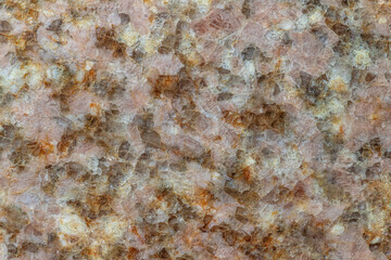 Polished pink granite texture. Macro.