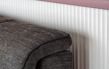 Close-up of armrest. Sofa upholstery detail.