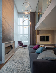 Luxury interior of private house. Living room with fireplace.