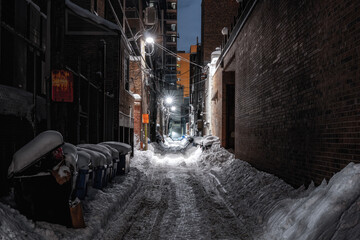 snow covered alley in the night