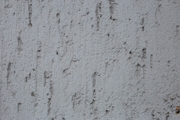 Light cold grey white plaster wall texture background.