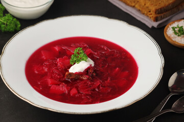 A plate with Ukrainian national dish - borsch