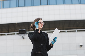 Portrait of a woman using cell phone, clubhouse