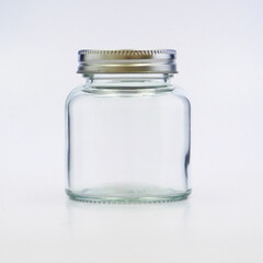 clear tall glass jar with silver lid, transparent, sparkly and brilliant, for food, liquids, sauces, grain, condiments, seeds, preserves and candys, also for decoration