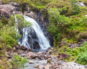 One of few bigger waterfalls at the beautiful Fairy pools on Isle of Skye, Scotland, UK