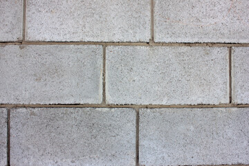 Obraz premium Gray brick wall background. Stone wall texture