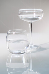Glass glasses with fresh drinking water. Copy space.