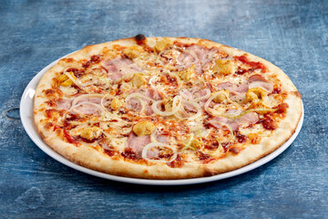 pizza on the wooden background