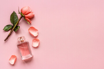 Fragrances perfume bottle with flowers, flat lay, top view