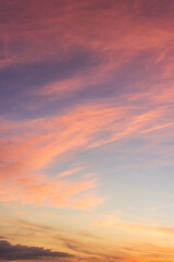 Sunset sky vertical over sea in the evening with colorful orange sunlight,