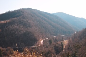 A country road in the middle of hills (Marche, Italy, Europe)
