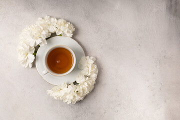 Cup of tea in flowers for international women's day