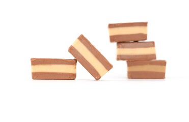 Cremino chocolate filled with hazelnut paste on white background. It's a traditional italian sweet from Piedmont