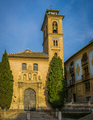 Fototapeta na wymiar San Gil y Santa Ana church with its cute little bell tower in Granada, Andalusia, Spain