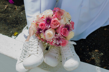 casual lesbian wedding, shoes and flower bouquet