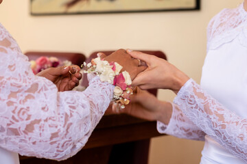 lesbian couple getting married rings
