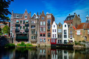 Fototapeta na wymiar Rotterdam, Netherlands - July 5, 2019: Dutch architecture in Delfshaven, the historical district of the city of Rotterdam in the Netherlands