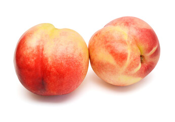 Two peach fruit isolated on white background