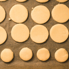 cookies or alfajores tapas on a baking sheet