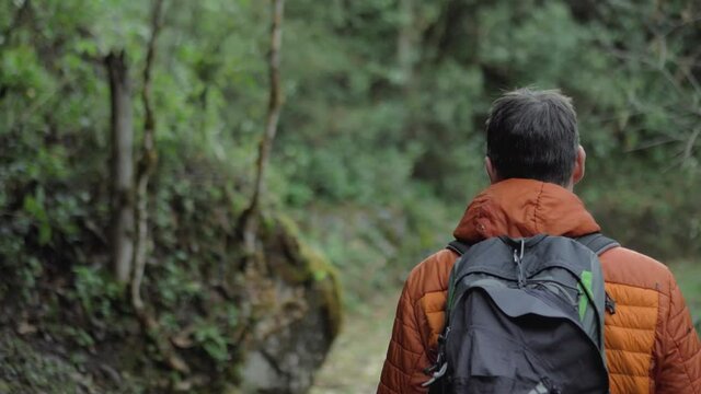 Male model with couple walking in the  nature trail, road to vilcabamba, machu picchu.