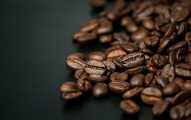 coffee beans on black background.