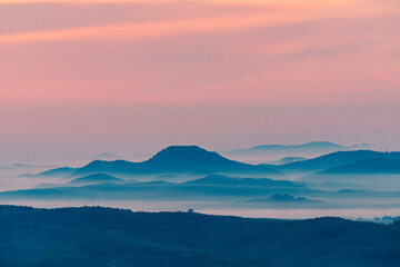 Obraz premium Morning in the mountains. Fog covering the mountain forests.