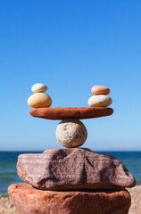 Concept of harmony and balance. Balance stones against the sea.