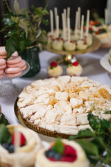 Close up of a light baked meringue cake on a Wedding candy bar