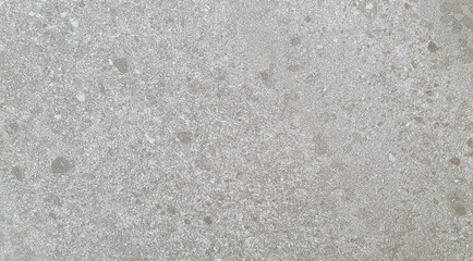 luxury rusty grey pebble tile used for interior flooring material. polished concrete floor and wall pattern. granite slab stone ceramic tile, polished quartz or marbel texture background.