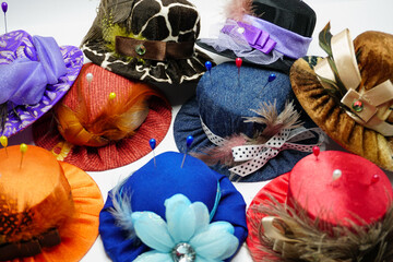 Bespoke pincushion designs in the shape of hats for dressmaking sewing craft