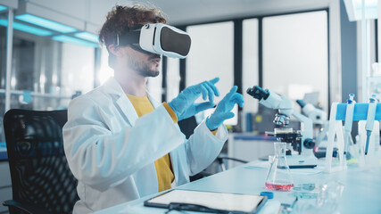 Futuristic Medical Research Laboratory: Modern Scientist Wearing Virtual Reality Headset, Does...